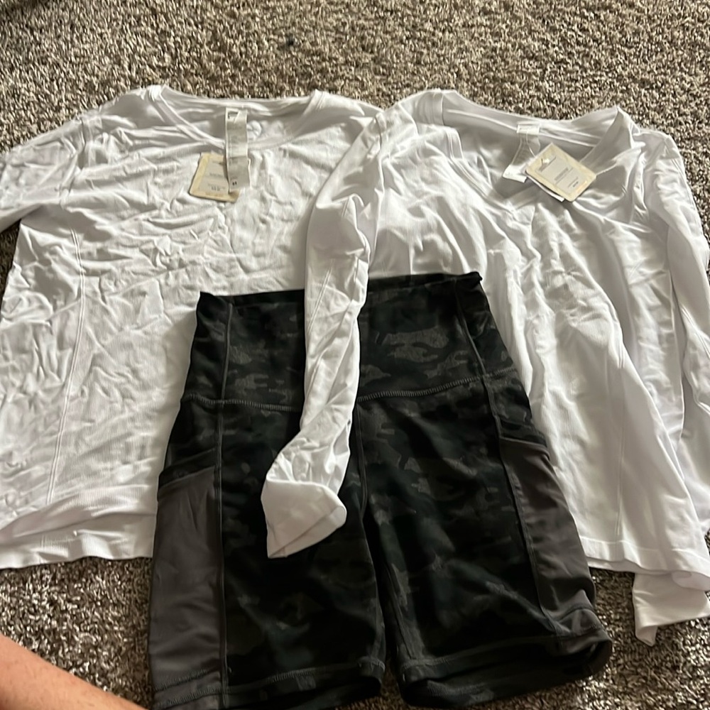 Bundle of 3 Fabletics: 2 Med Feather Tech Tops, 1 camo Powerhold shorts small***